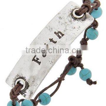 Burnished Silver Tone Turquoise Stone Brown Cord Metal Religious Faith Bracelet