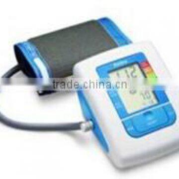 Arm blood pressure monitor with charge measurement