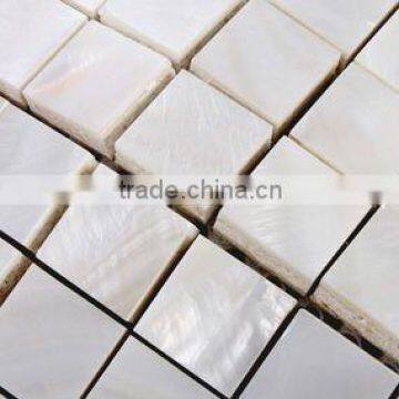 Glass fiber base pure white river shell mosaic tiles with slugged bottom