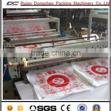 Economic type cake or bread oil on paper roll to sheets cutting machine