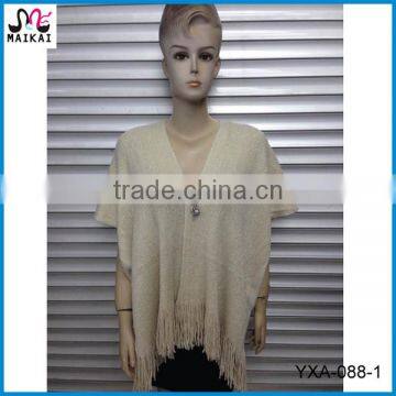 High fashion ladies poncho knitting pattern with gold lurex