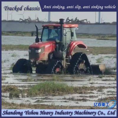 Tractor modified with triangular track wheels for stable anti sinking vehicle in swampy and muddy areas