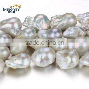 Irregular shape pearl strand 15-16mm AA- nucleated freshwater pearl strand wholesale