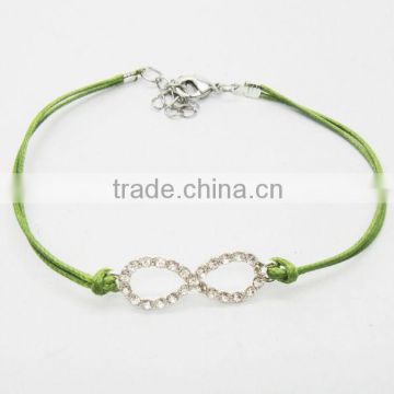 Green wire diamante number eight alloy woven bracelet