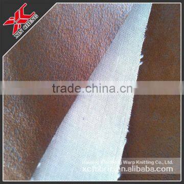 Bronzing bronzed suede with lamination of T/C bonding fabric