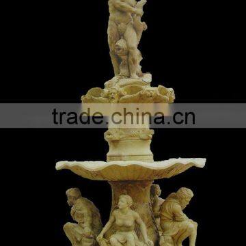 Large outdoor yellow stone water fountain