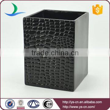 Black colored embossed luxury ceramic desktop trash can