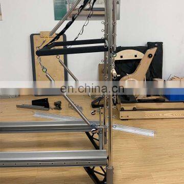 Тренировка мышц с высококачественным складным пилатес-реформером из алюминия. Алюминиевый пилатес-реформер с башней photo-2