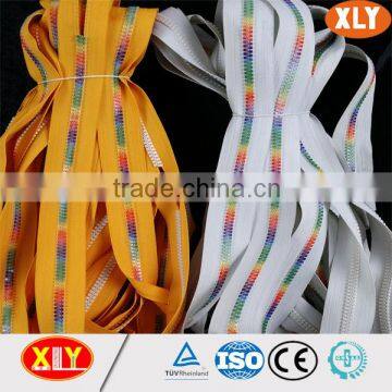 Special design multi-color plastic zipper rolls, custom derlin zipper for bags