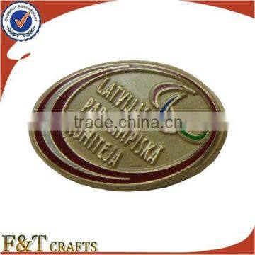 custom made gold oval badge with enamel