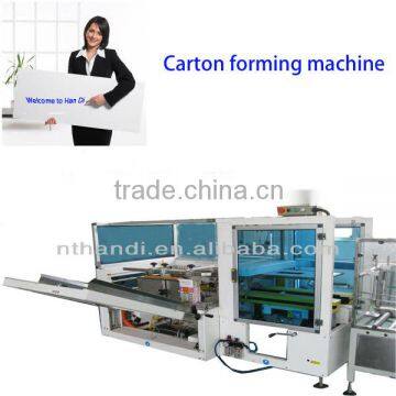 Commisioning supplied case forming machine from Shanghai Port