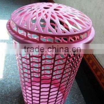 Large plastic laundry basket with lid