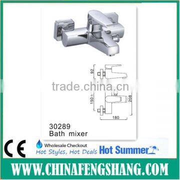 Exposed wall mounted bath and shower mixer tap with divertor