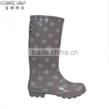 Rubber rain boot women fashion boot has pink ground with white circle printed