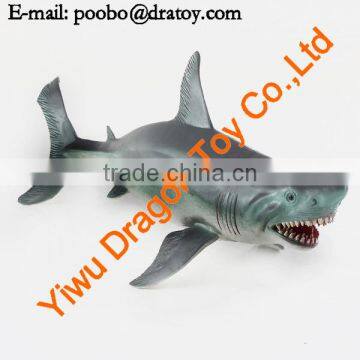 small plastic toy sharks