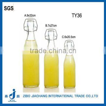 2016 wholesale different colors clear round glass swing top fruit juice bottles 1L