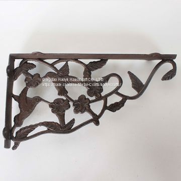 Cast Corner Shelf with birds