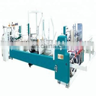 Automatic corrugated paper sheet gluing machine