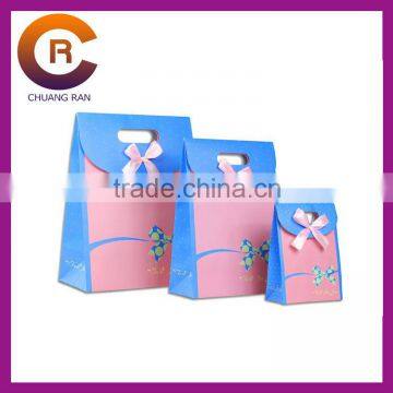 blue and pink printing cheap Christmas paper gift bags with handles