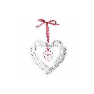 hanging white wicker heart for Christmas decoration