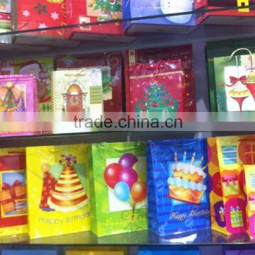 Hot sale cheap custom paper bag Designs with handles for promotion