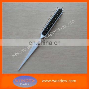 Plastic tail hair brush with massage cushion and mental pins