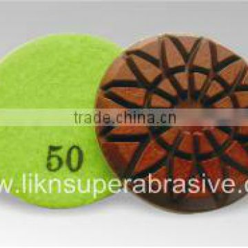 Rose-type dry concrete polishing pad with metal ips