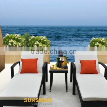 Black rattan beach poolside chairs lounger