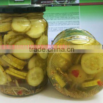 Pickled sliced cucumbers in glass jars