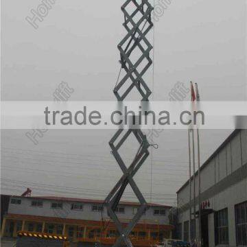 Mobile scissor lift platform with battery charger for outdoor