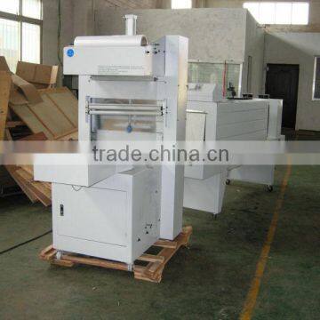 Shrink-wrapping packing machine film shrink wrapping machine PE film wrapping machine