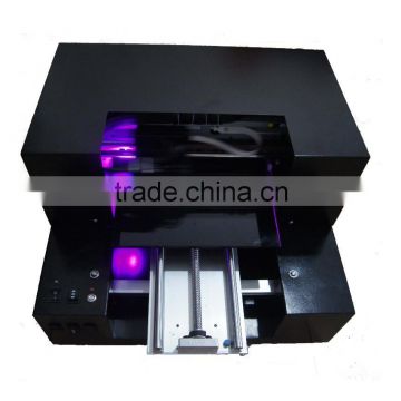 cheap a3 6color uv flatbed printer printing onto PVC Card, USB, Wood, Case directly