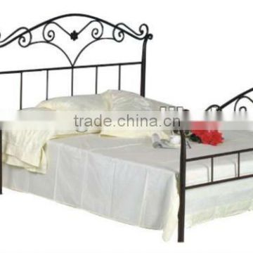 Metal double queen bed with night table