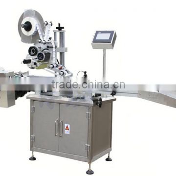 Automatic adhesive label machine for tube