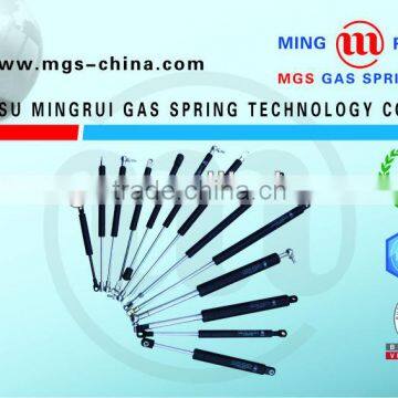 Compression gas spring with different end fitting for AUTO
