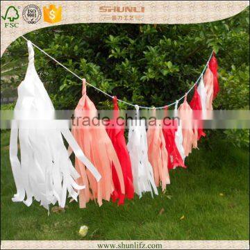 Red tissue paper tassel garland for christmas party favor