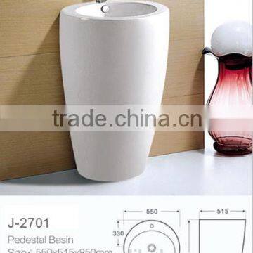 white ceramic pedestal hand washing sink