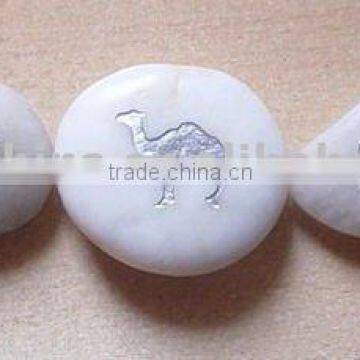 white engraved pebble