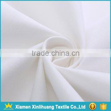 China Woven Textile White Color 100% Cotton Plain Fine Canvas Fabric