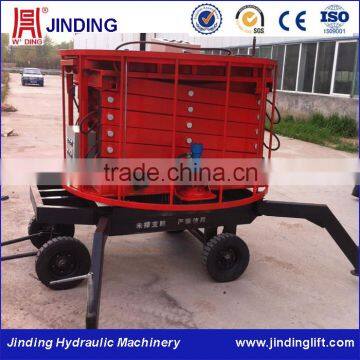 4 wheels drag type hydraulic scissor lift 1 tons loading for stage