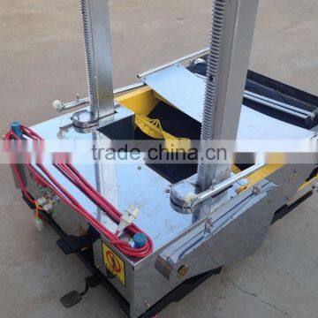 New technology automatic wall cement mortar rendering machine , plastering machine