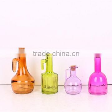 colored glass oil bottle with cork