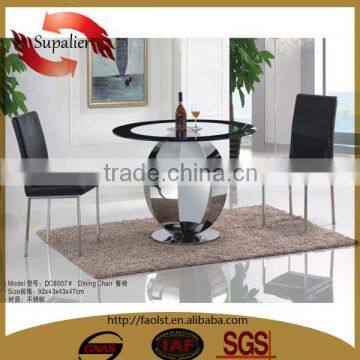 round glass top and stainless steel frame dining table