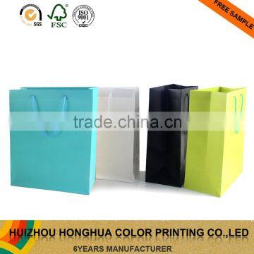 Wholesale embossing processing kraft bag paper gift bags with handles