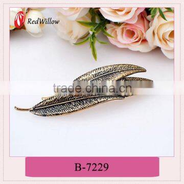 New design fashion low price hair clips for women,feather ponytail holder,tiara accessory