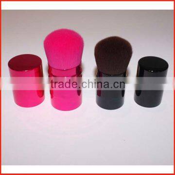 Retractable loose powder dispensing brushes