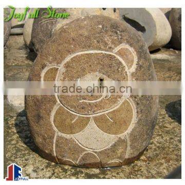 Boulder stone ornaments, bear on stone