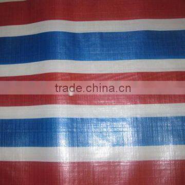 red/blue/white striped tarpaulin tent fabric