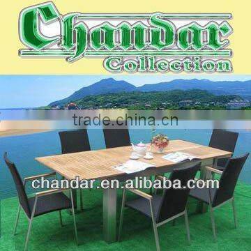 Brushed aluminum extendable teak table and wicker chair furniture set