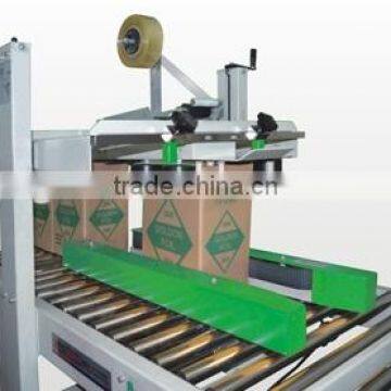 Automatic carton sealer